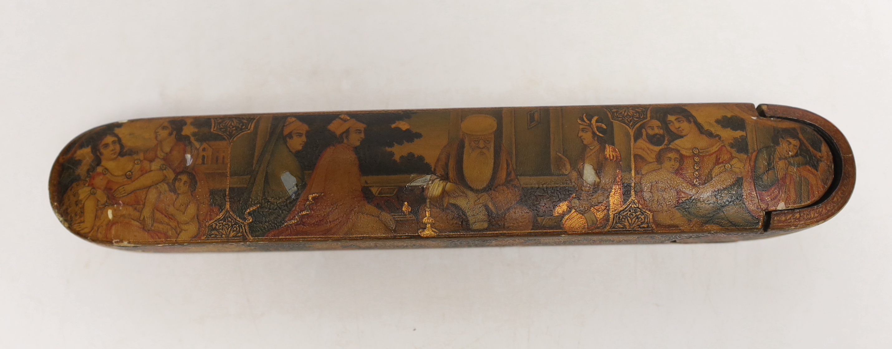 A Persian Qalamdan papier mache scribes or pen box, Qajar dynasty, 22.5cm in length